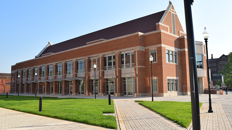 Exterior photo of the Student Union building, a large brick building of 3 stories.
